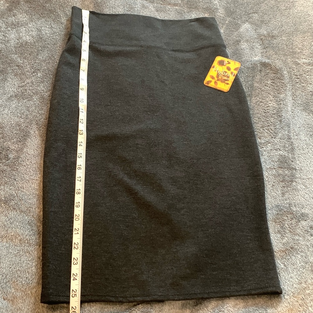 Grey stretch pencil skirt knee length with 6 in slit in back tags on